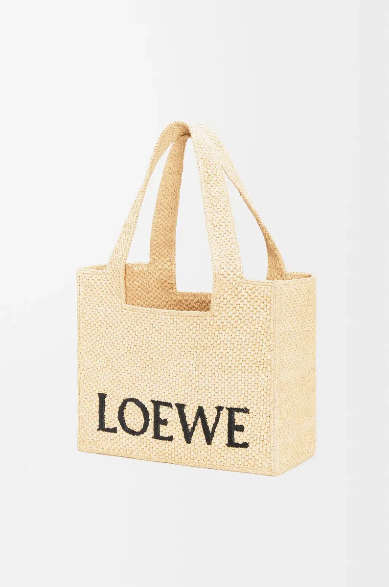 mittelgroße loewe font tragetasche aus bast natur