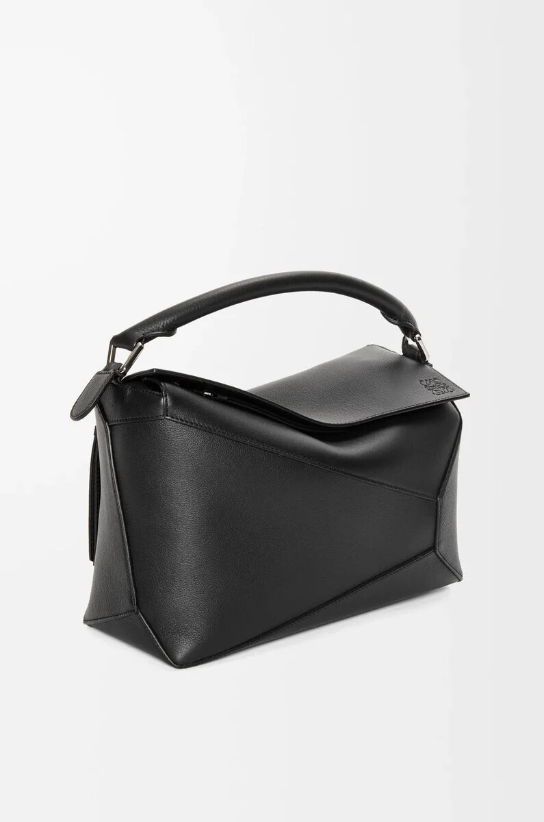 mittelgroße puzzle edge tasche aus klassischem kalbsleder schwarz