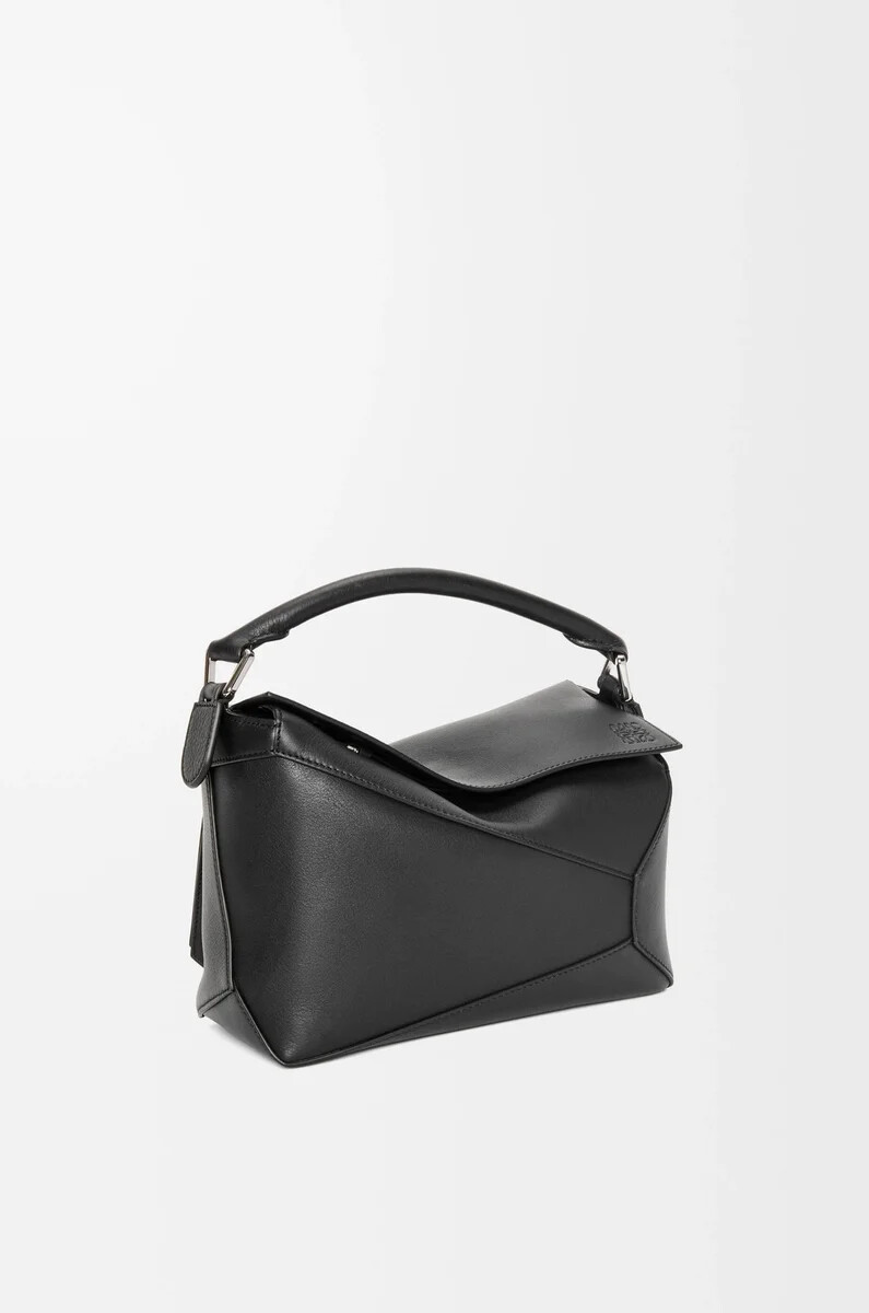 kleine puzzle edge tasche aus klassischem kalbsleder in schwarz