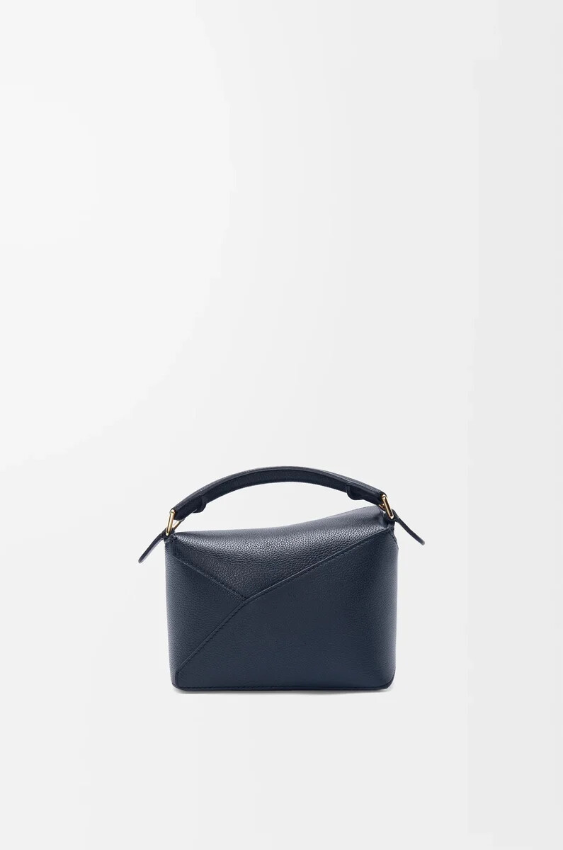 mini puzzle edge tasche aus weichem genarbtem kalbsleder in dunkelblau